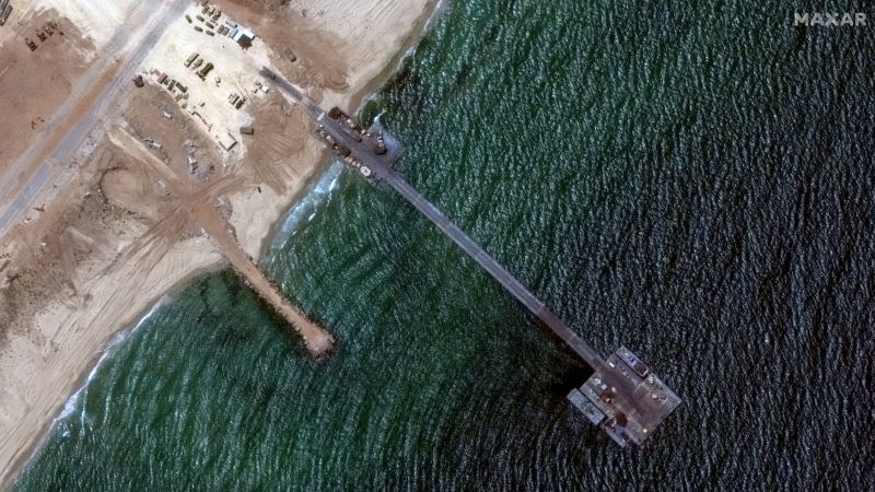 US Military’s Temporary Pier Reanchored to Gaza Coast After Weather Delays: Aid Delivery Stalled
