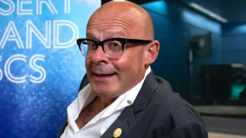 Harry Hill Reveals How His Stepfather’s Death Inspired His Shift from Medicine to Comedy