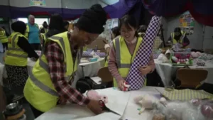 Community Comes Together to Gift Hope: Over 100 Volunteers Wrap Christmas Presents for Children in Need